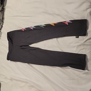 Never worn girls size 11/12 grey leggings with rainbow lighting bolts
